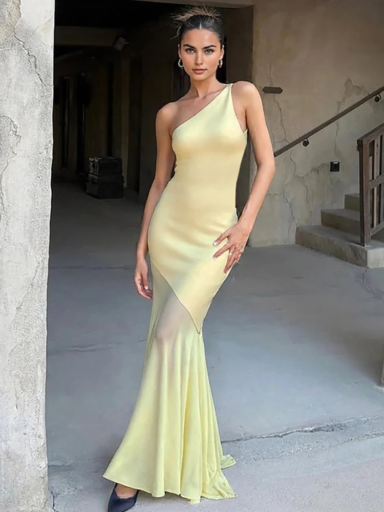 Elegant Backless Maxi Dress with Patchwork Detailing VestiVogue