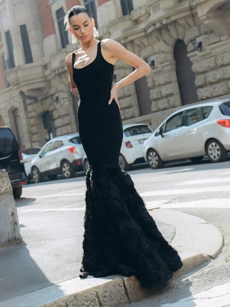 Elegant Black Maxi Gown with Turtleneck and Appliqué Details VestiVogue