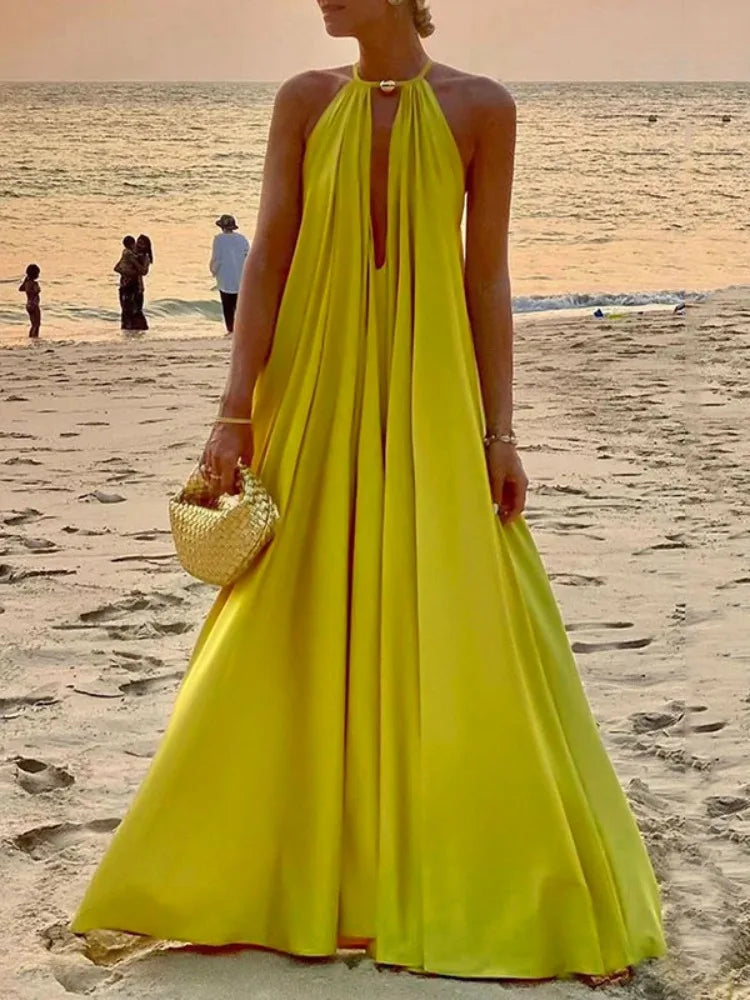 Vibrant Yellow Halter Neck Pleated Maxi Dress VestiVogue