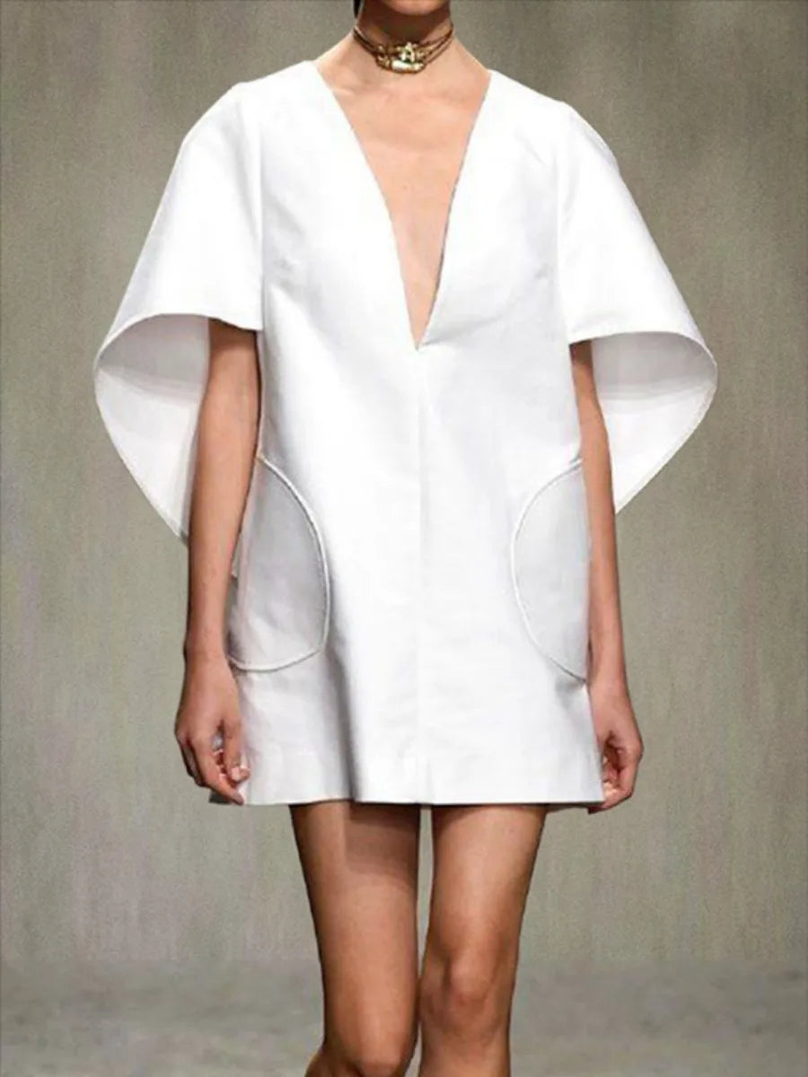 Effortless Chic Deep V-Neck Mini Dress with Flare Sleeves VestiVogue