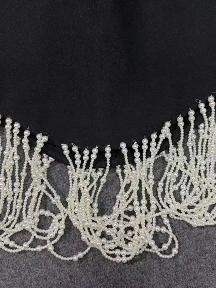 Elegant Off-Shoulder Black Bodycon Dress with Pearl Detail VestiVogue