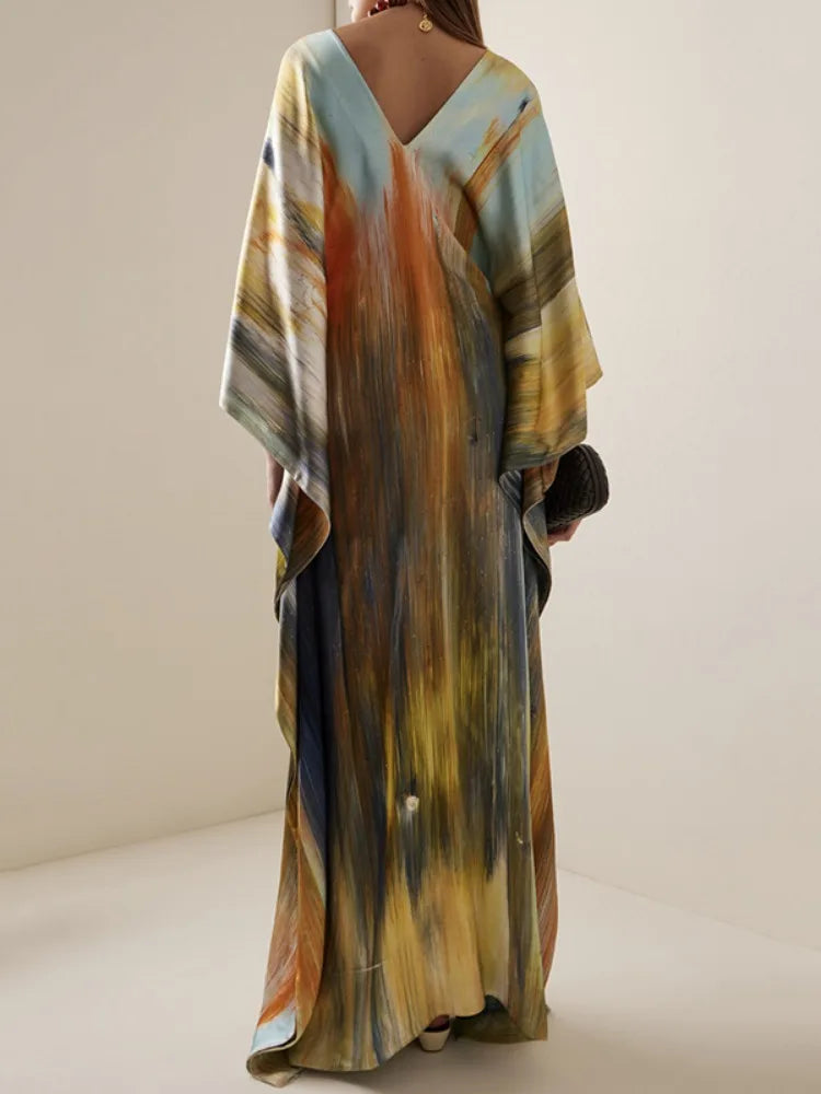 Chic Deep V-neck Batwing Maxi Dress with Ruffle Details VestiVogue