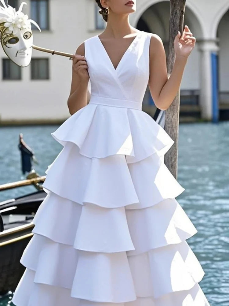 Elegant Tiered Sheer Maxi Dress with V-Neck and Pleated A-Line Silhouette VestiVogue