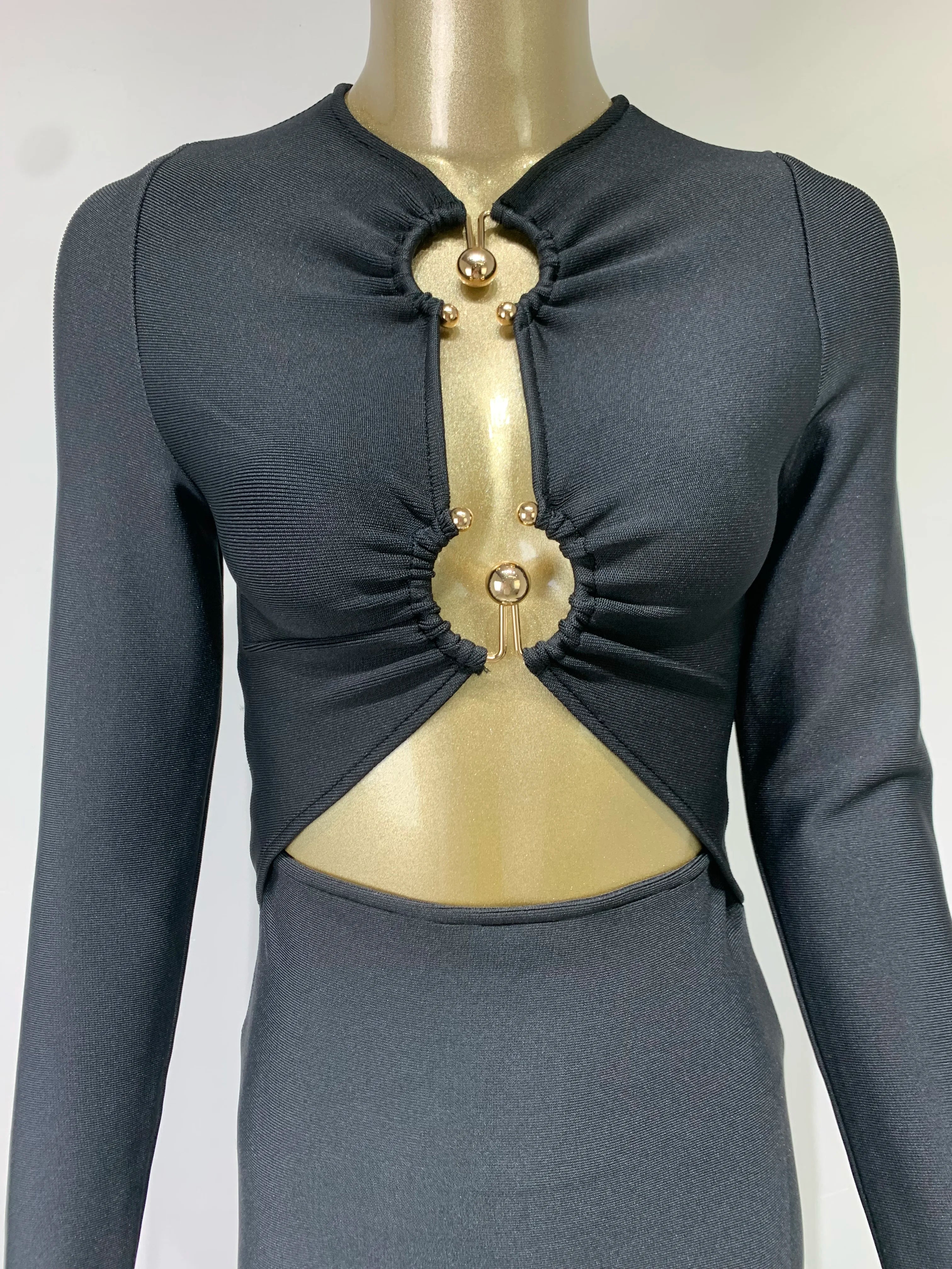 Elegant Black Sequined Bodycon Mini Dress with Hollow-Out Design VestiVogue