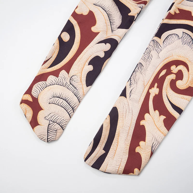 Chic One-Shoulder Printed Jumpsuit with Slim Fit and Long Sleeves VestiVogue