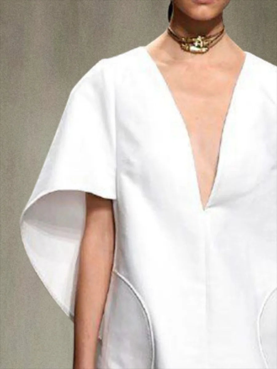 Effortless Chic Deep V-Neck Mini Dress with Flare Sleeves VestiVogue